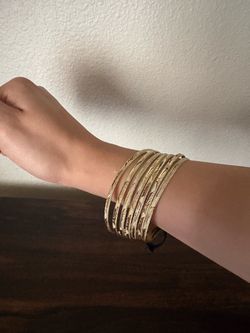 Women gold laminated bangles seven set