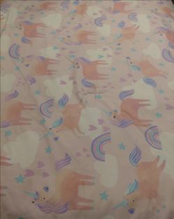 Brand new unicorn twin size comforter reviserable hearts on the other side.  Come with a twin sheets set .