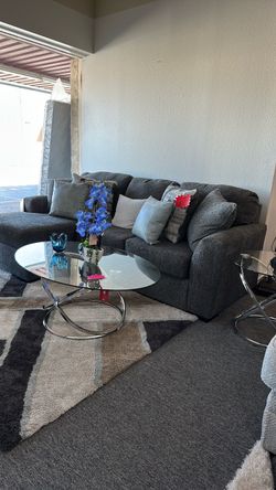 Gray sofa sectional with a reversible chase