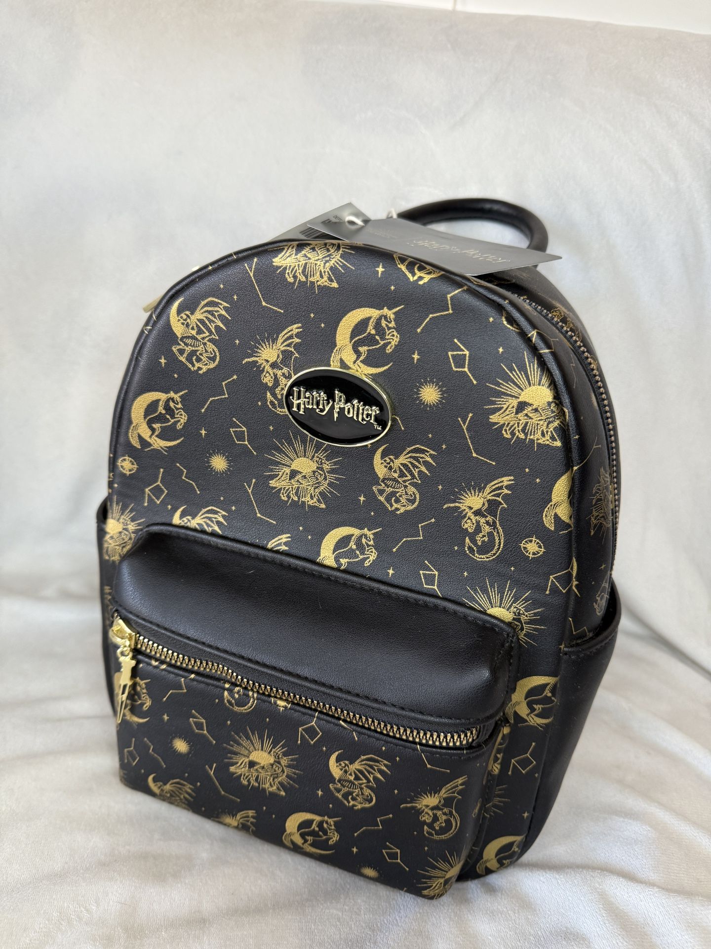 * 87th Ave & Olive* *NWT* Harry Potter Celestial Magical Creatures Mini Backpack Gold/Black. Harry Potter wand zipper charm. Black interior fabric. 