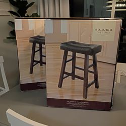 2 saddle counter stools