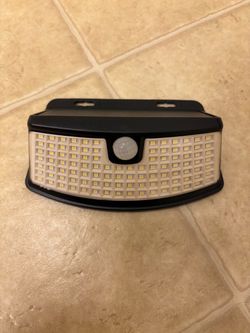 Outdoor solar motion light