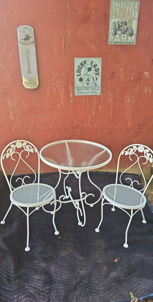 2 Chairs And Wavy Glass Top Table