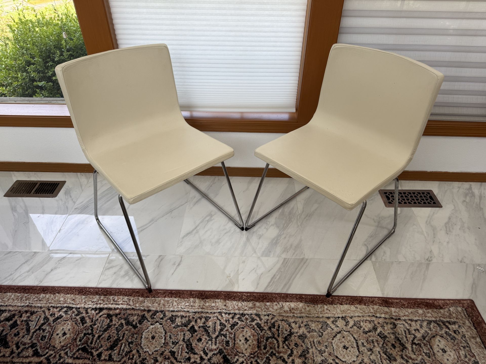 2 Ivory pleather chairs