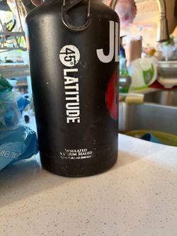 Large black water jug for juice drinks water
