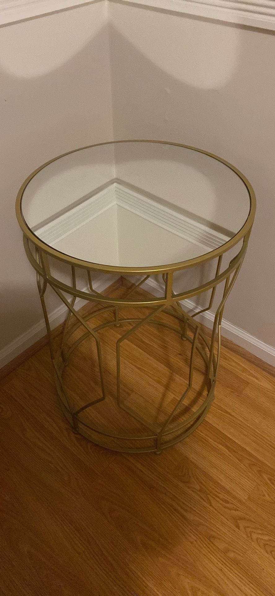 Round mirrored accent table