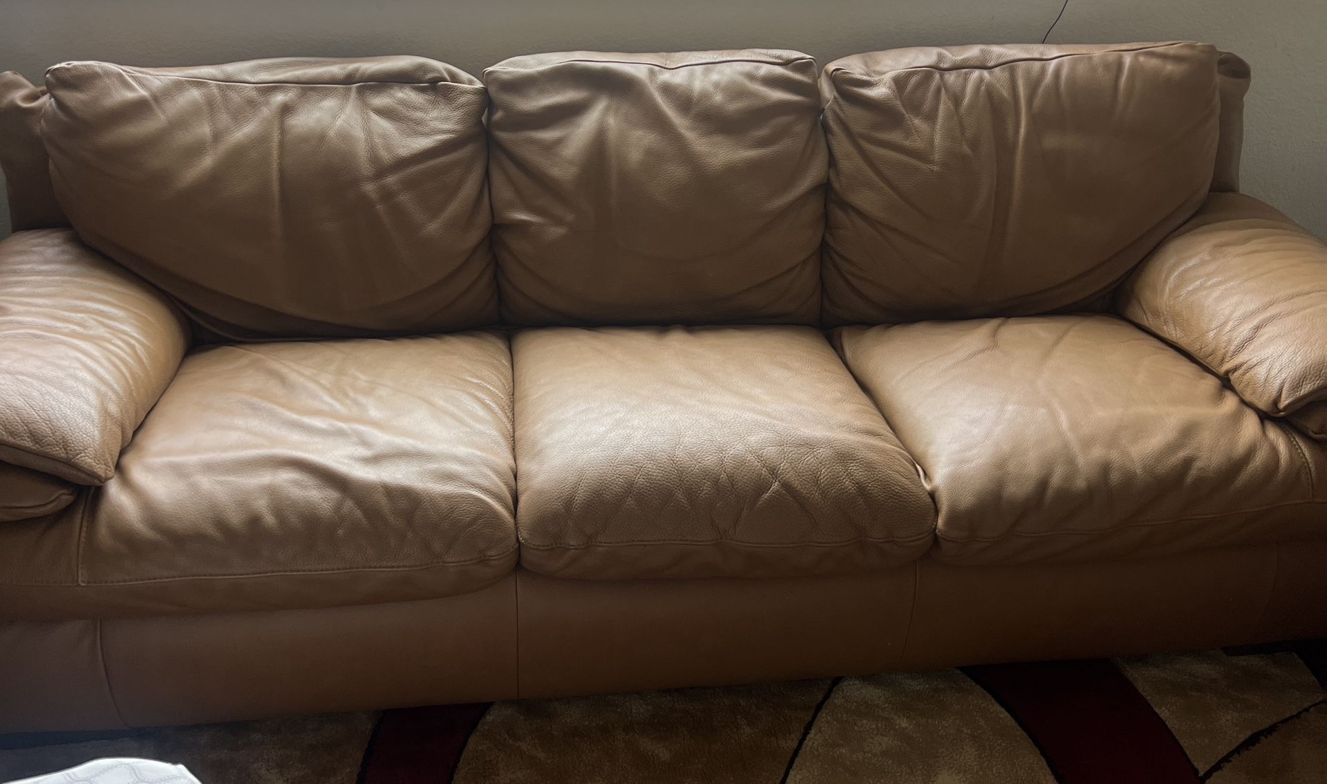 Natuzzi leather sofa And Loveseat.