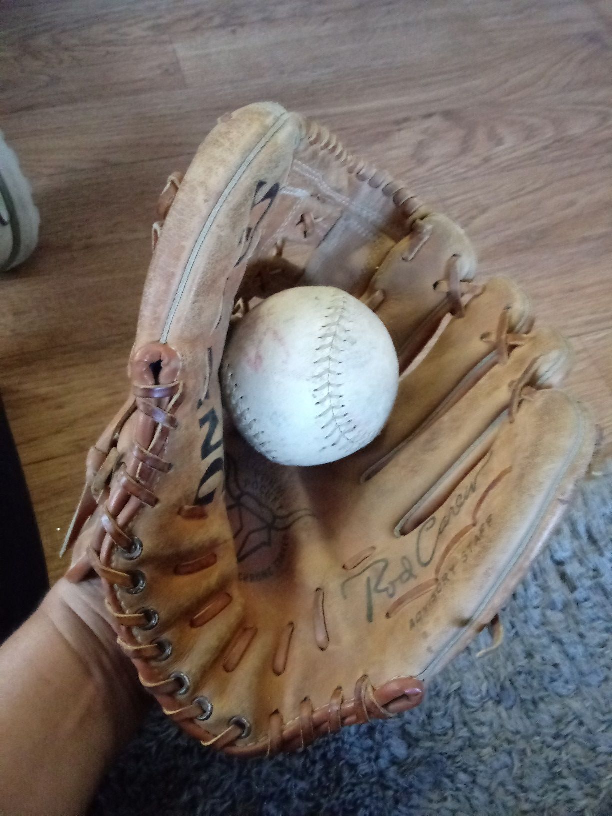 Left. Handed baseball glove and ball