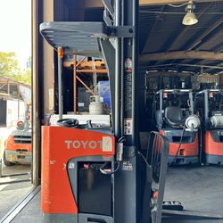 2014 TOYOTA ELECTRIC STAND UP REACH FORKLIFT 