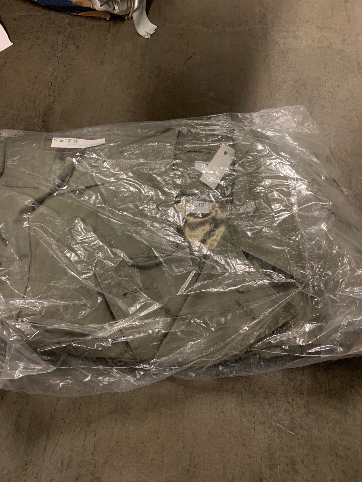 Old army issued rain coat jacket size 42 brand new and wrapped.