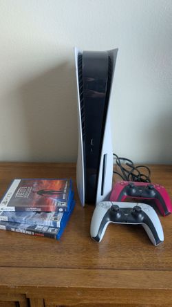 PS5 disc edition with two controllers and games bundle