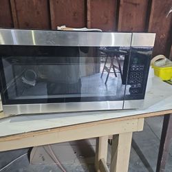 Over The Range Microwave 75$    Brand New