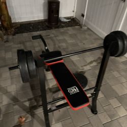 Marcy Pro Bench, Black and Red. Comes With 100lbs Of Weights