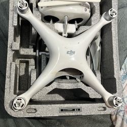 white DJI Phantom drone 