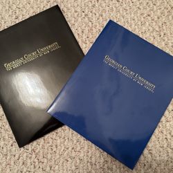 2 New Georgian Court University logo pocket folders. Black & blue