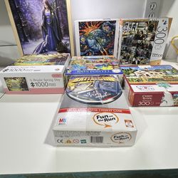 puzzles.  Lot of 7 puzzles  !  