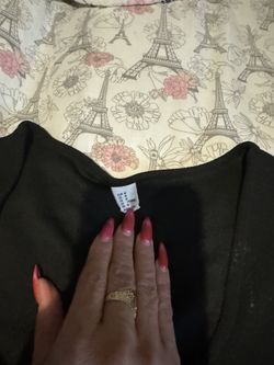 Women’s black dress with polkadot sleeves