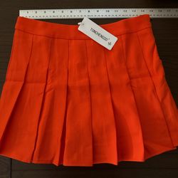 Orange Pleated Mini Skirt