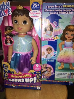 Baby Alive Grows Up With Care Literally! Speaks English & Spanish Includes 9PCS Including Growth Chart
