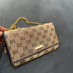Pre Owed Authentic Gucci Brown With dark  Brown With Dark Leather  Wallet With Gold Strap 