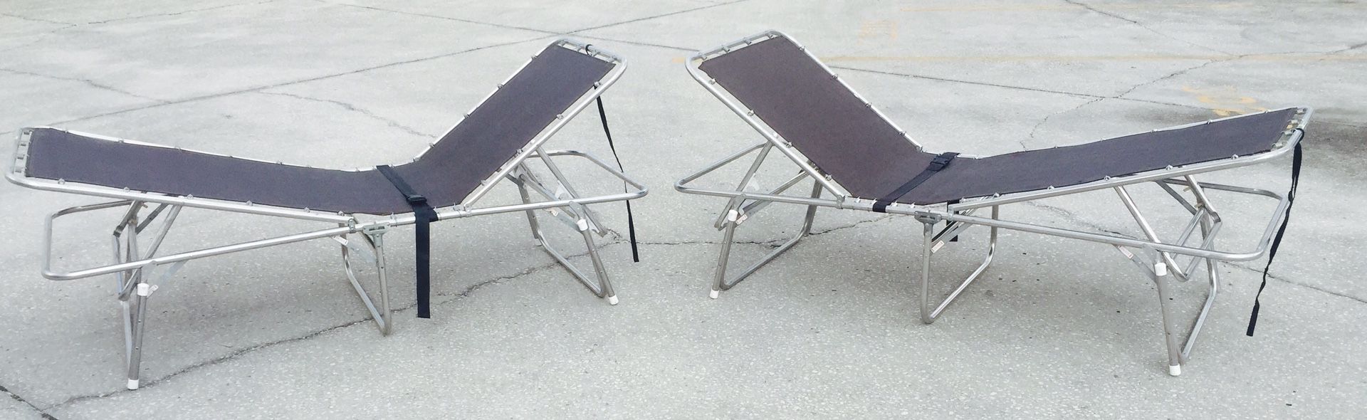 Two folding cots