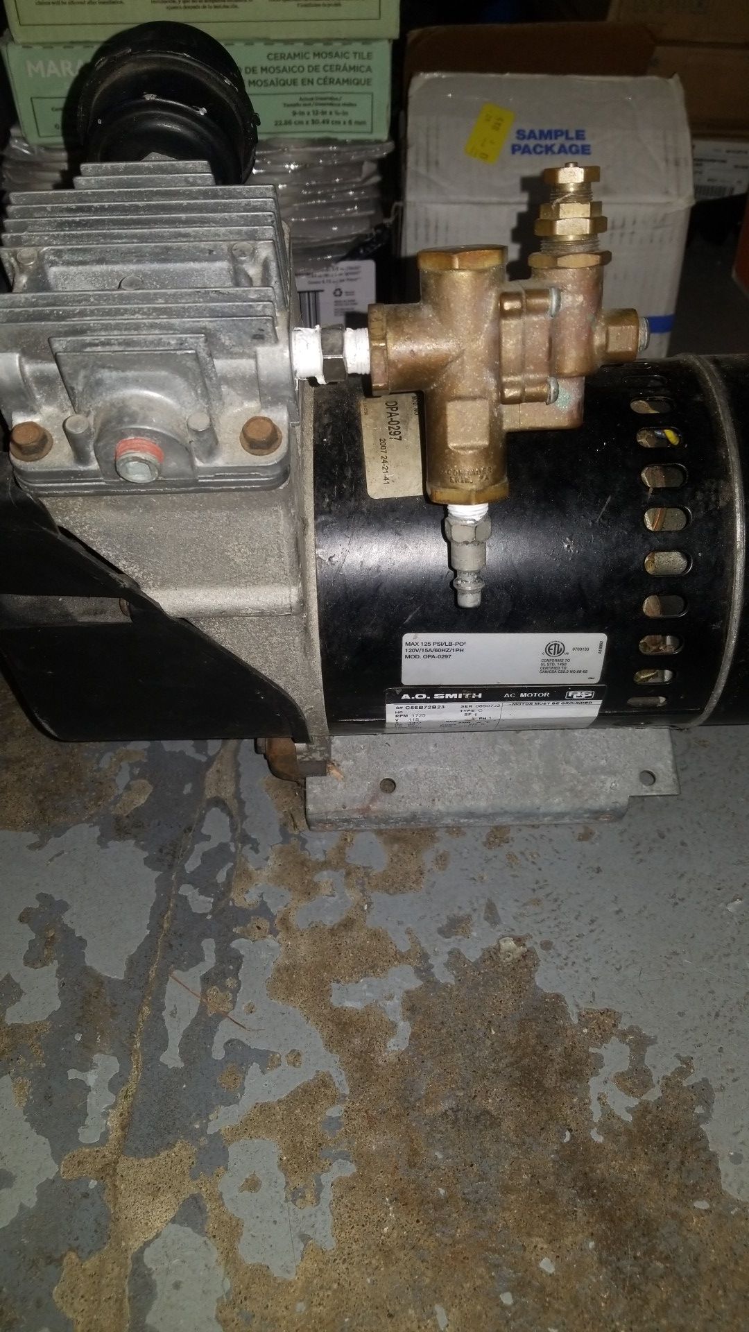 A.O SMITH commercial air compressor tire inflator with hose.