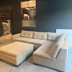 Tan Fabric Sectional Sofa with Ottoman