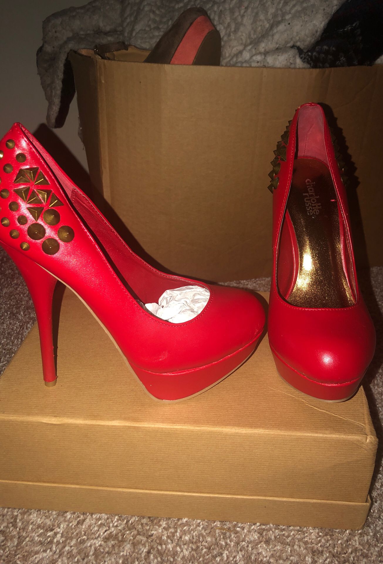 Red spiked heels