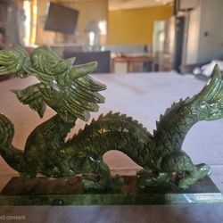 Carved jade dragon statue