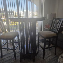 Round wood table and 2 seats