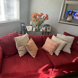 Red Sofa! In great condition and available for immediate pick up!