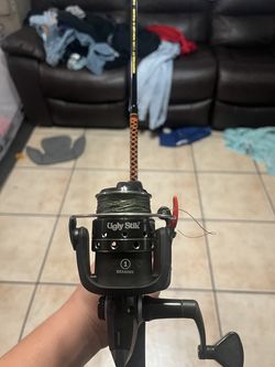 Brand new ugly stik fishing pole with braided line