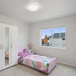 Strawberry-themed kids bed in very good, gently used condition