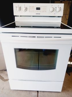 estufa Samsung limpia todo trabaja con garantía $ 270