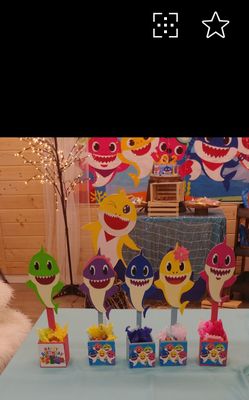 Center pieces made of wood $7.00 each. Cloth back drop banner $20.00 . Happy Birthday banner $5.00