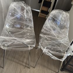 NEW ghost 2x ghost chairs $25 make offer moving