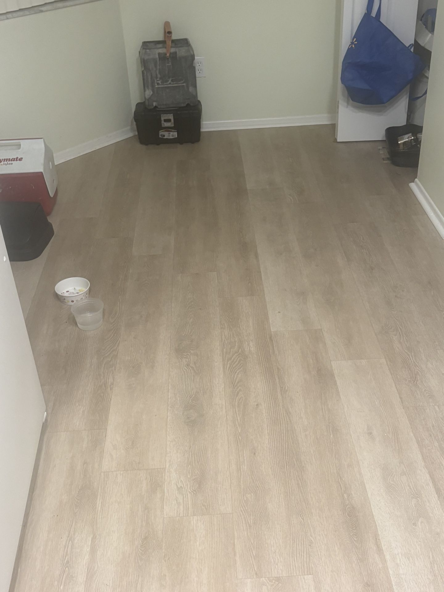 Almost new padded waterproof flooring with padding and soundproofing from a second floor condo