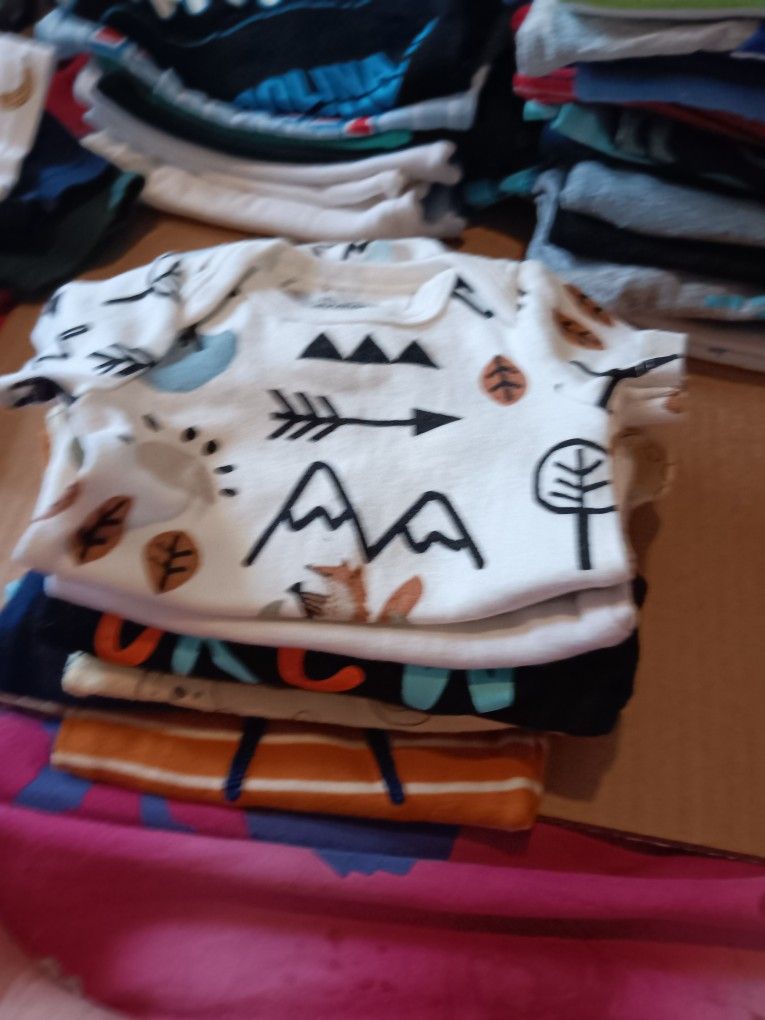 Selling baby boy clothing and newborn baby boy shoes.