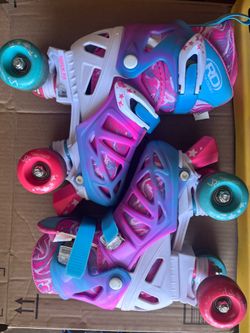 Kids pink/blue roller skates