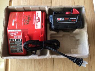 Milwaukee M18 Charger And XC5.0 Battery.  Brand NEW.  NUEVO.