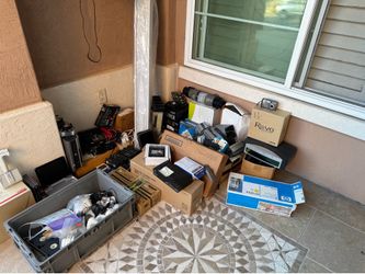 Large lot of electronics, calculators, cameras, toners, etc. MUST TAKE ALL