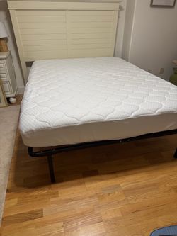 Bed frame and Queen mattress - never used
