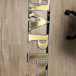 Happy Birthday Wall Banner with Paper Napkins and Candles