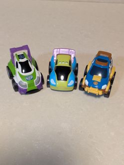 Set of 3 matchbox size Pixar toy story pullback cars.