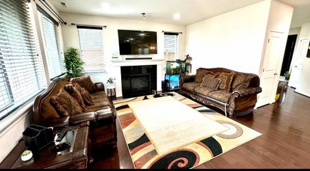 Elegant Carved Wood & Leather Sofa Set with Paisley Cushions