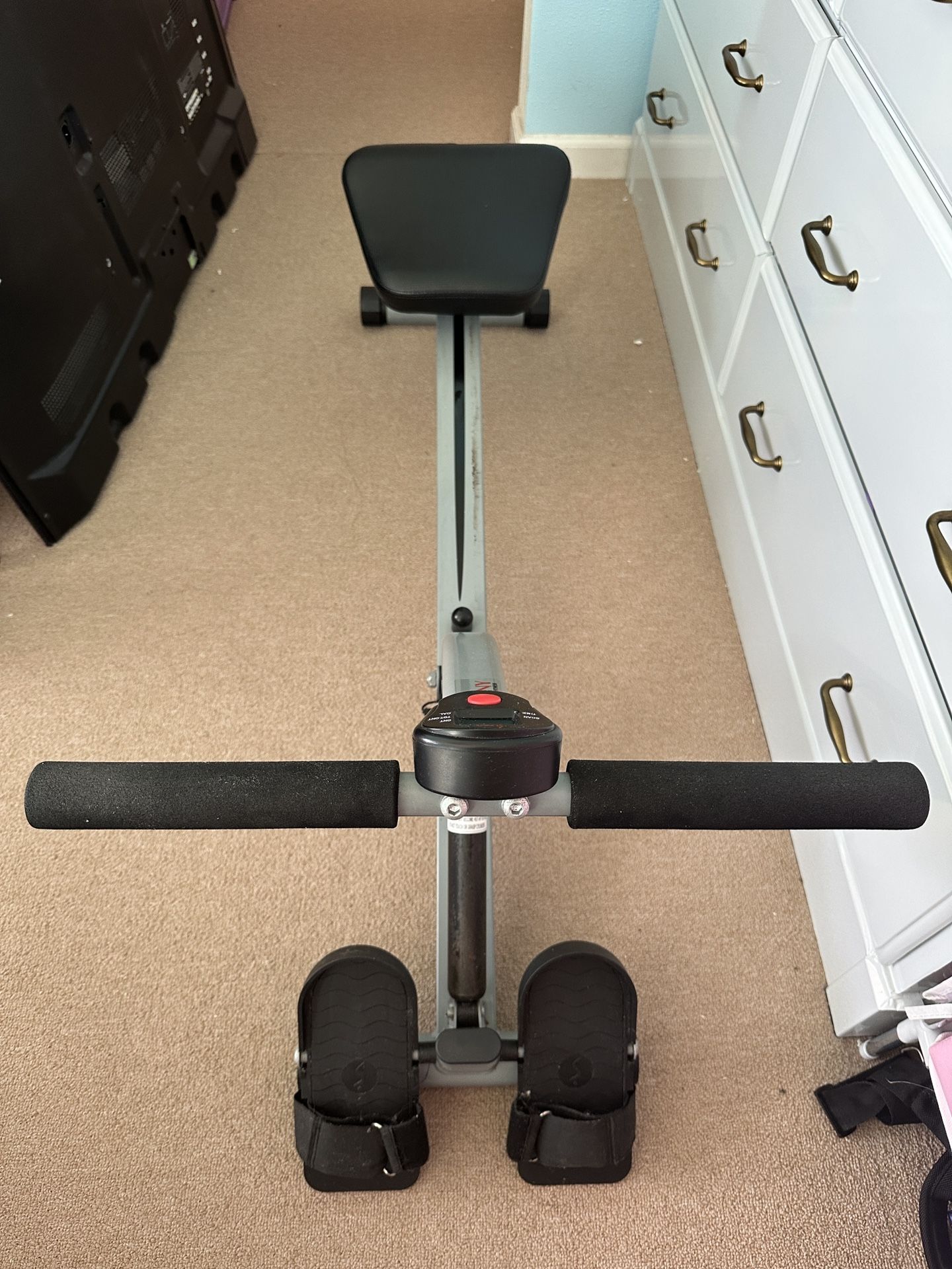 Sunny Health & Fitness Compact Adjustable Rowing Machine with 12 Levels of Complete Body Workout