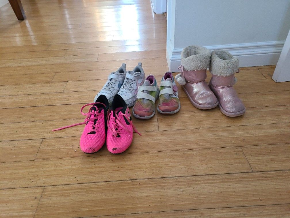 Four Pair Of Shoes