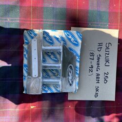 Suzuki LT 250 HD swing arm skid