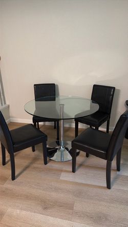Glass table and 4 chairs $100!