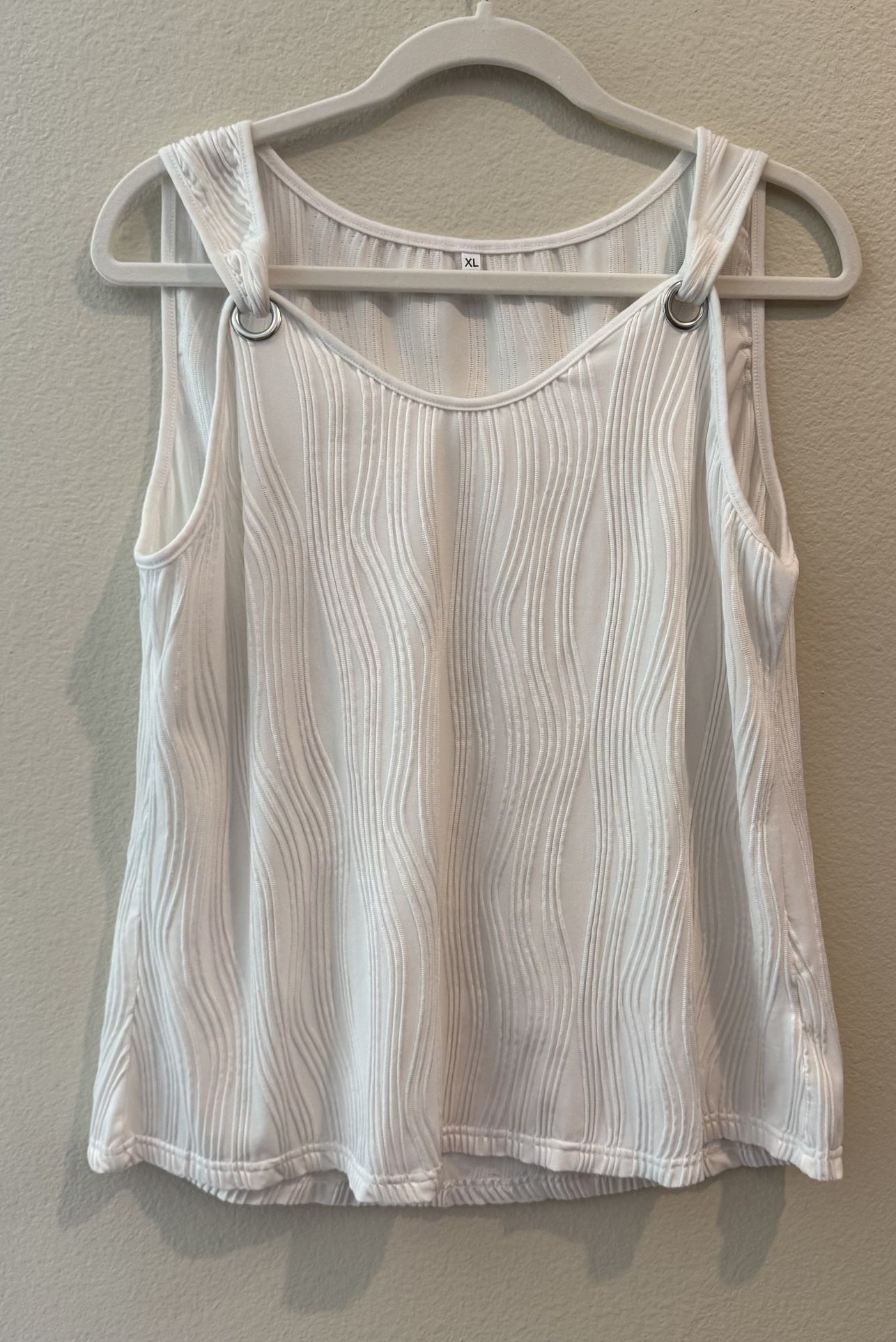 White ribbed tank top with o ring on shoulder from amazon. NWOT. Size Women’s XL